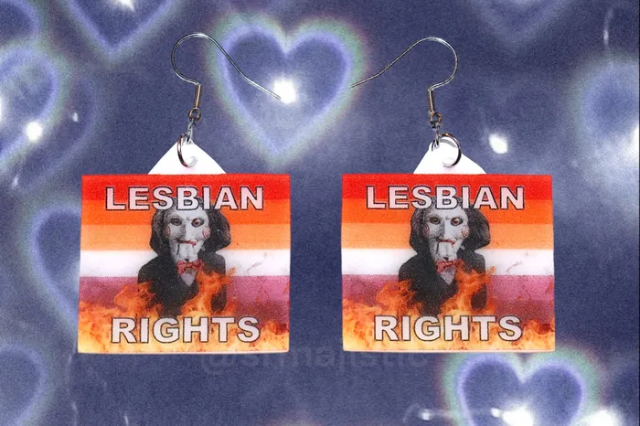 Sam Makes Things Earrings READY TO SHIP Jigsaw Billy the Puppet Saw Character Collection of Flaming Pride Flags Handmade Earrings Sam Makes Things Earrings READY TO SHIP Jigsaw Billy the Puppet Saw Character Collection of Flaming Pride Flags Handmade Earrings