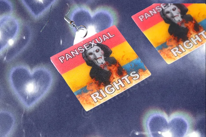 Sam Makes Things Earrings READY TO SHIP Jigsaw Billy the Puppet Saw Character Collection of Flaming Pride Flags Handmade Earrings Sam Makes Things Earrings READY TO SHIP Jigsaw Billy the Puppet Saw Character Collection of Flaming Pride Flags Handmade Earrings