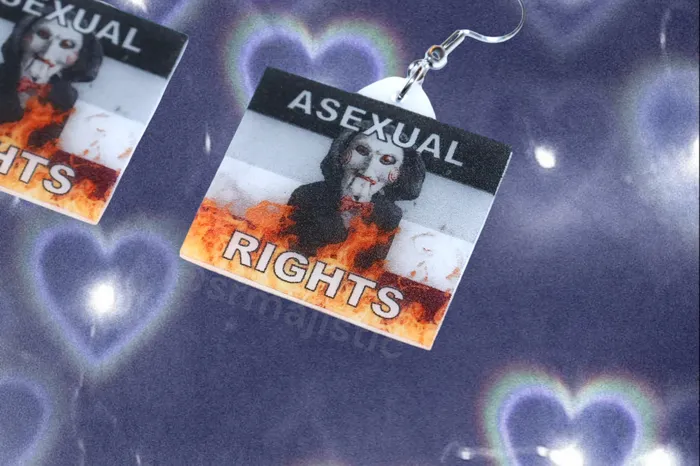 Sam Makes Things Earrings READY TO SHIP Jigsaw Billy the Puppet Saw Character Collection of Flaming Pride Flags Handmade Earrings Sam Makes Things Earrings READY TO SHIP Jigsaw Billy the Puppet Saw Character Collection of Flaming Pride Flags Handmade Earrings