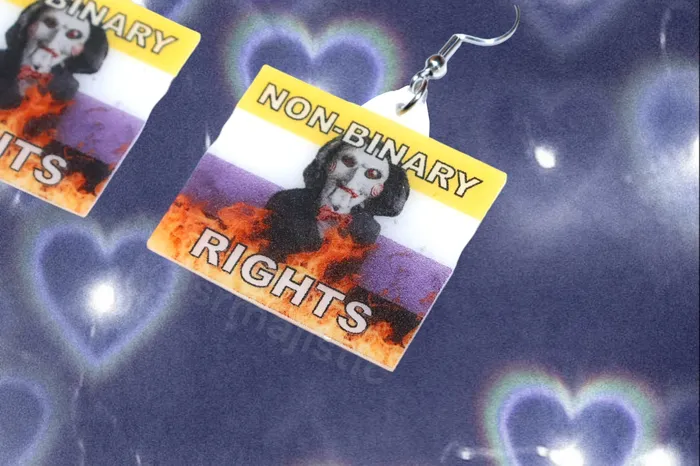 Sam Makes Things Earrings READY TO SHIP Jigsaw Billy the Puppet Saw Character Collection of Flaming Pride Flags Handmade Earrings Sam Makes Things Earrings READY TO SHIP Jigsaw Billy the Puppet Saw Character Collection of Flaming Pride Flags Handmade Earrings