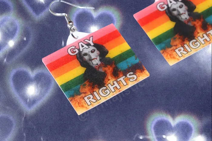 Sam Makes Things Earrings READY TO SHIP Jigsaw Billy the Puppet Saw Character Collection of Flaming Pride Flags Handmade Earrings Sam Makes Things Earrings READY TO SHIP Jigsaw Billy the Puppet Saw Character Collection of Flaming Pride Flags Handmade Earrings