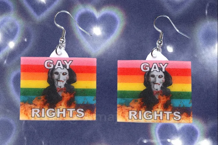 Sam Makes Things Earrings READY TO SHIP Jigsaw Billy the Puppet Saw Character Collection of Flaming Pride Flags Handmade Earrings Sam Makes Things Earrings READY TO SHIP Jigsaw Billy the Puppet Saw Character Collection of Flaming Pride Flags Handmade Earrings