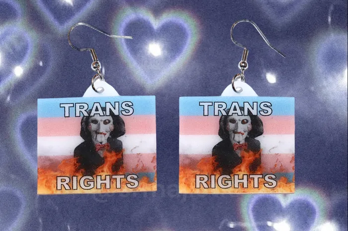 Sam Makes Things Earrings READY TO SHIP Jigsaw Billy the Puppet Saw Character Collection of Flaming Pride Flags Handmade Earrings Sam Makes Things Earrings READY TO SHIP Jigsaw Billy the Puppet Saw Character Collection of Flaming Pride Flags Handmade Earrings