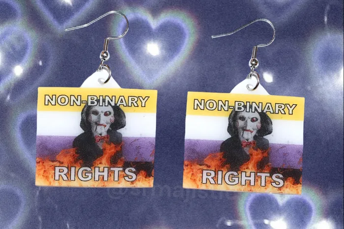Sam Makes Things Earrings READY TO SHIP Jigsaw Billy the Puppet Saw Character Collection of Flaming Pride Flags Handmade Earrings Sam Makes Things Earrings READY TO SHIP Jigsaw Billy the Puppet Saw Character Collection of Flaming Pride Flags Handmade Earrings