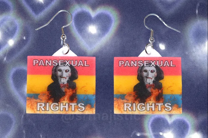 Sam Makes Things Earrings READY TO SHIP Jigsaw Billy the Puppet Saw Character Collection of Flaming Pride Flags Handmade Earrings Sam Makes Things Earrings READY TO SHIP Jigsaw Billy the Puppet Saw Character Collection of Flaming Pride Flags Handmade Earrings