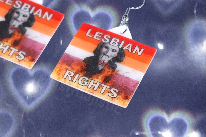 Sam Makes Things Earrings READY TO SHIP Jigsaw Billy the Puppet Saw Character Collection of Flaming Pride Flags Handmade Earrings Sam Makes Things Earrings READY TO SHIP Jigsaw Billy the Puppet Saw Character Collection of Flaming Pride Flags Handmade Earrings