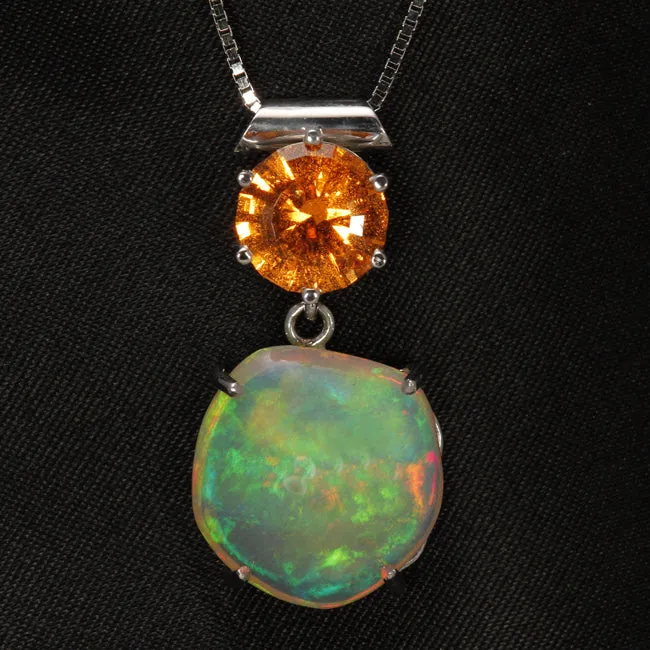 14K White Gold Welo Freeform Cabochon Opal and Spessartite Garnet Pendant Moriartys Gem Art Necklaces 14K White Gold Welo Freeform Cabochon Opal and Spessartite Garnet Pendant Moriartys Gem Art Necklaces